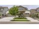Attractive home with a two-car garage and well-manicured lawn, in a desirable neighborhood at 1063 Sandstone Cir, Erie, CO 80516