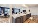 Bright kitchen featuring granite countertops, stainless steel appliances, and hardwood flooring at 1063 Sandstone Cir, Erie, CO 80516