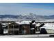 Exterior winter view featuring a snow-capped mountain range at 1063 Sandstone Cir, Erie, CO 80516