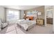 Bright bedroom features a neutral palette, plush carpet, and stylish decor at 3347 Belleville Ridge Rd, Elizabeth, CO 80107