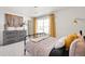 Comfortable bedroom design with soft bedding, a full-length mirror, and a stylish dresser at 3347 Belleville Ridge Rd, Elizabeth, CO 80107