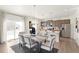 Inviting dining space with modern furnishings, seamlessly connected to the kitchen and living areas at 3347 Belleville Ridge Rd, Elizabeth, CO 80107