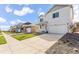 Street shot showing the house, driveway, and some landscaping with grass and gravel at 3347 Belleville Ridge Rd, Elizabeth, CO 80107