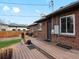 Inviting back deck with access to the house and views of the backyard with plenty of room at 2535 Leyden St, Denver, CO 80207