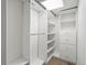 A spacious closet with custom shelving, drawers, and ample hanging space to organize clothing and accessories at 2535 Leyden St, Denver, CO 80207