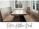 Cozy kitchen nook featuring built-in seating and natural light, perfect for casual dining and intimate gatherings at 2535 Leyden St, Denver, CO 80207
