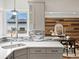 Modern kitchen showcasing a stylish countertop, decorative backsplash, and contemporary accents creating an inviting cooking space at 2535 Leyden St, Denver, CO 80207