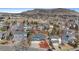 Aerial view of the house showcasing its location within a neighborhood with parks and mountain views at 1304 5Th St, Golden, CO 80403