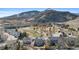 The aerial view displays the community's layout and its proximity to the mountains at 1304 5Th St, Golden, CO 80403