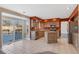 Modern kitchen with stainless steel appliances, cabinets, an island and tiled floor at 1304 5Th St, Golden, CO 80403