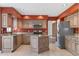 Spacious kitchen featuring stainless steel appliances, cabinets, and tiled floors at 1304 5Th St, Golden, CO 80403