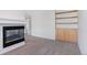Living Room features a sleek fireplace, built-in shelving and contemporary design elements at 1304 5Th St, Golden, CO 80403