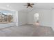 Main bedroom features vaulted ceilings, large windows, and an arched entry to the bathroom at 1304 5Th St, Golden, CO 80403