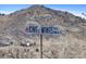 Sign for King Of Wings Tap & Tequila restaurant, set against a mountain backdrop in an outdoor setting at 1304 5Th St, Golden, CO 80403