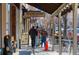 Charming street view of Golden Goods Market with people walking on the sidewalk, showcasing the unique local shops at 1304 5Th St, Golden, CO 80403