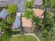 Aerial view showing the homes, lush greenery, lawns, and neighborhood at 9016 W Alabama Pl, Lakewood, CO 80232