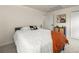 Cozy bedroom with a queen-sized bed, soft lighting, and modern decor for a relaxing retreat at 9016 W Alabama Pl, Lakewood, CO 80232