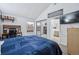 Spacious bedroom showcasing a sliding mirrored closet and an ensuite bathroom at 2003 S Helena St # D, Aurora, CO 80013