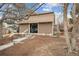 Exterior view of a well-maintained multi-Gathering residence with inviting entrance and beautiful landscaping at 2003 S Helena St # D, Aurora, CO 80013
