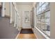 Inviting entryway with hardwood floors, staircase, and large window with natural light at 2003 S Helena St # D, Aurora, CO 80013