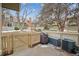 The backyard patio features a privacy fence, ample seating, and outdoor storage space at 2003 S Helena St # D, Aurora, CO 80013