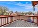 Private balcony with wood decking and railing with neighborhood views at 1236 Sequerra St, Broomfield, CO 80020