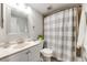Clean bathroom with vanity, toilet, and shower/tub combination at 1236 Sequerra St, Broomfield, CO 80020
