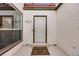 Covered front door and welcome mat at 1236 Sequerra St, Broomfield, CO 80020