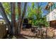 Cozy backyard featuring a gazebo with wrought-iron seating, perfect for outdoor entertaining and relaxation at 7684 Beverly Blvd, Castle Pines, CO 80108