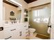 Modern bathroom with stylish vanity, sleek shower, and elegant fixtures providing a luxurious feel at 7684 Beverly Blvd, Castle Pines, CO 80108