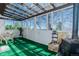 Bright and airy sunroom featuring a transparent roof and large windows, offering serene views of the outdoors at 7684 Beverly Blvd, Castle Pines, CO 80108