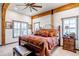 Bedroom with natural light and wood beam accents at 8191 S Homesteader Dr, Morrison, CO 80465