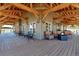 Large covered patio with outdoor seating and dining area, perfect for entertaining and enjoying the view at 8191 S Homesteader Dr, Morrison, CO 80465