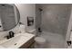Updated bathroom with modern vanity, fixtures, and tiled shower/tub at 12506 E Cornell Ave # 201, Aurora, CO 80014