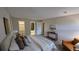 Comfortable main bedroom featuring multiple closets and calming decor at 12506 E Cornell Ave # 201, Aurora, CO 80014