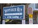 Spinnaker Run Condominiums sign at the Landing, welcoming residents at 12506 E Cornell Ave # 201, Aurora, CO 80014