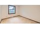 Small bedroom with carpet, a single window, and neutral paint at 2556 S Eagle Cir, Aurora, CO 80014