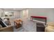 Inviting basement area with comfortable seating and a classic coffee table at 8299 E Kenyon Ave, Denver, CO 80237