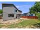 Home featuring a spacious backyard with a patio and plenty of room for outdoor activities at 4422 E Andover Ave, Castle Rock, CO 80104