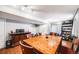 Basement dining area includes tiled floors, wood table with chairs and a decorative cabinet at 4422 E Andover Ave, Castle Rock, CO 80104