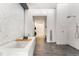 Contemporary bathroom with a luxurious soaking tub, walk-in shower, and modern fixtures at 1610 Little Raven St # Ph6, Denver, CO 80202