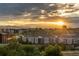 Wide angle city view from the condo balcony during sunset at 1610 Little Raven St # Ph6, Denver, CO 80202