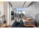 Stylish living room with floor to ceiling windows offering city views at 1610 Little Raven St # Ph6, Denver, CO 80202
