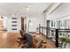 Cozy loft featuring comfortable seating, hardwood floors, and natural light at 1610 Little Raven St # Ph6, Denver, CO 80202