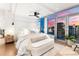 Bright main bedroom with large windows and sunset views at 1610 Little Raven St # Ph6, Denver, CO 80202