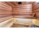 Inviting wooden sauna with multi-level benches and under-bench lighting at 1610 Little Raven St # Ph6, Denver, CO 80202