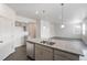 Kitchen with granite countertop island and stainless steel appliances at 4743 Hatcher Dr, Brighton, CO 80601