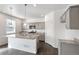 Bright, modern kitchen featuring stainless steel appliances, granite countertops, and a stylish island at 4743 Hatcher Dr, Brighton, CO 80601