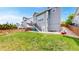 Spacious backyard with a well-maintained lawn and patio area, perfect for outdoor entertaining at 3717 Desert Ridge Cir, Castle Rock, CO 80108