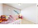 Bright bedroom with a cozy bed, a window with blinds, and a small study desk at 3717 Desert Ridge Cir, Castle Rock, CO 80108